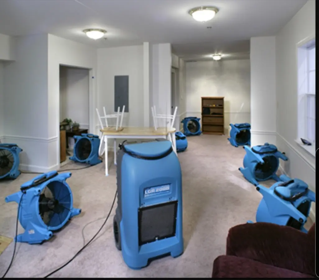 Air movers and dehumidifier setup for Water Damage Restoration in Falls